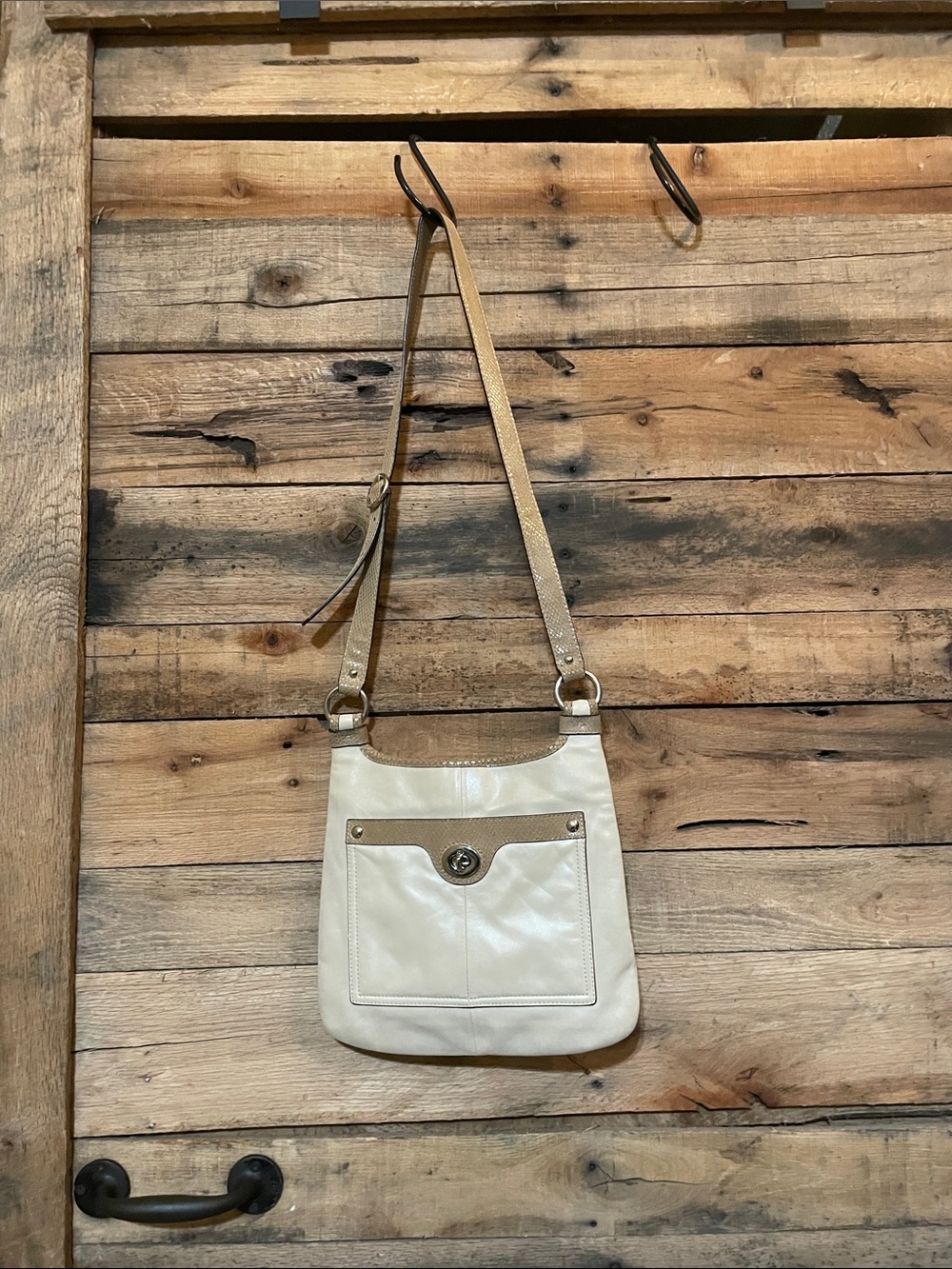 Coach Penelope Cream Crossbody Bag with Tan Trim and Strap.